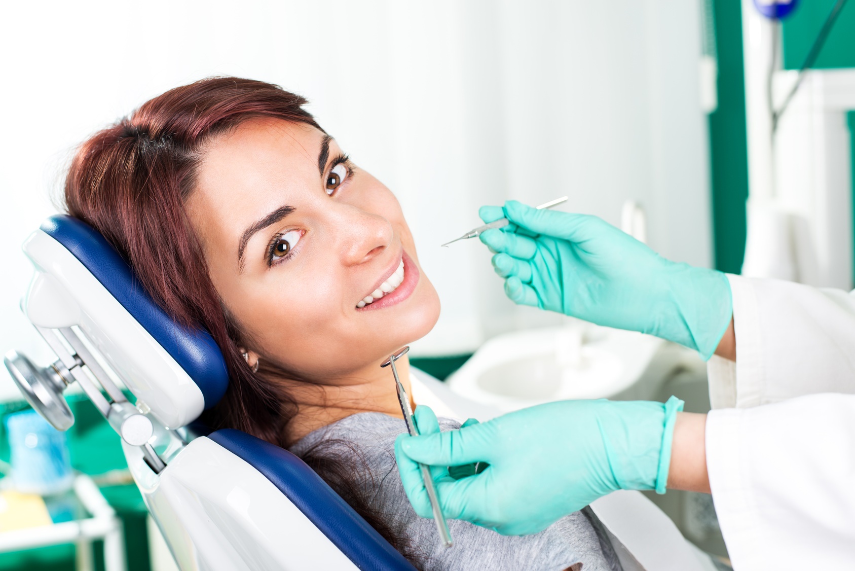 Smiling woman at dentist
